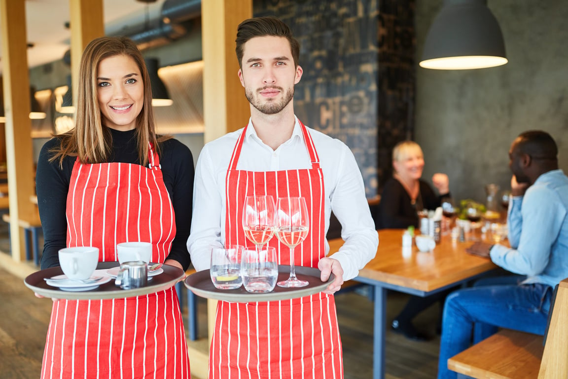 Male and Female Service Workers in a Restaurant