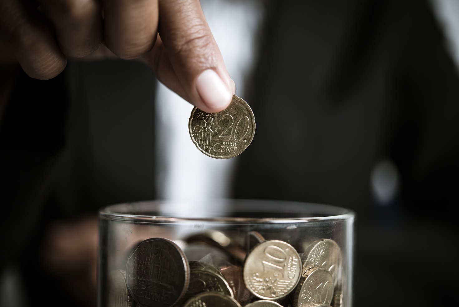 Businessman GIving Money Donation Charity Concept